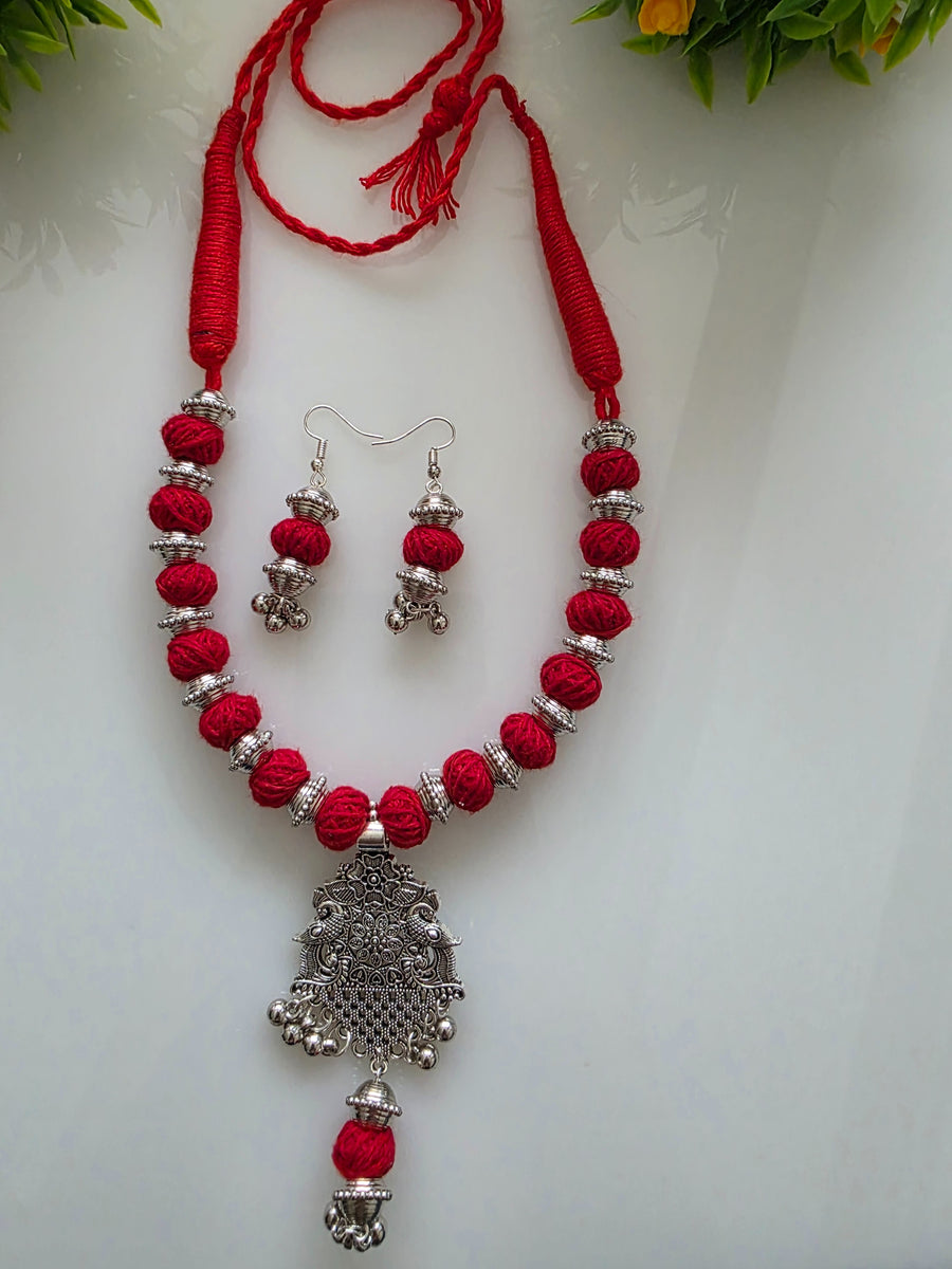 Red cotton balls necklace