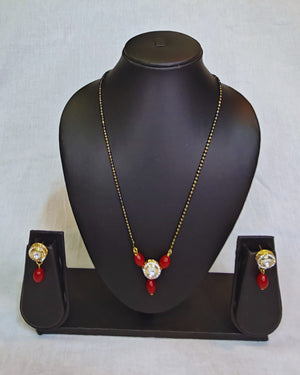 Polki kundan with red beads mangalsutra