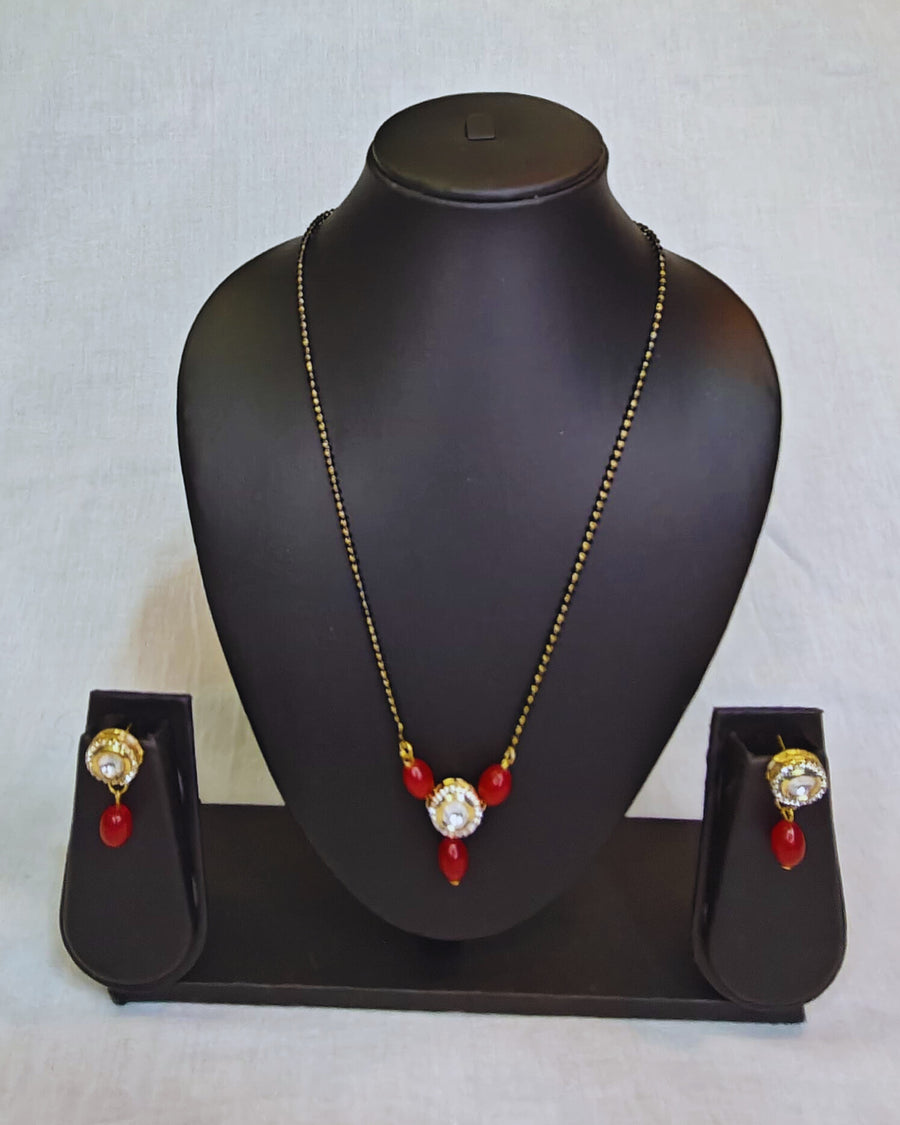 Polki kundan with red beads mangalsutra