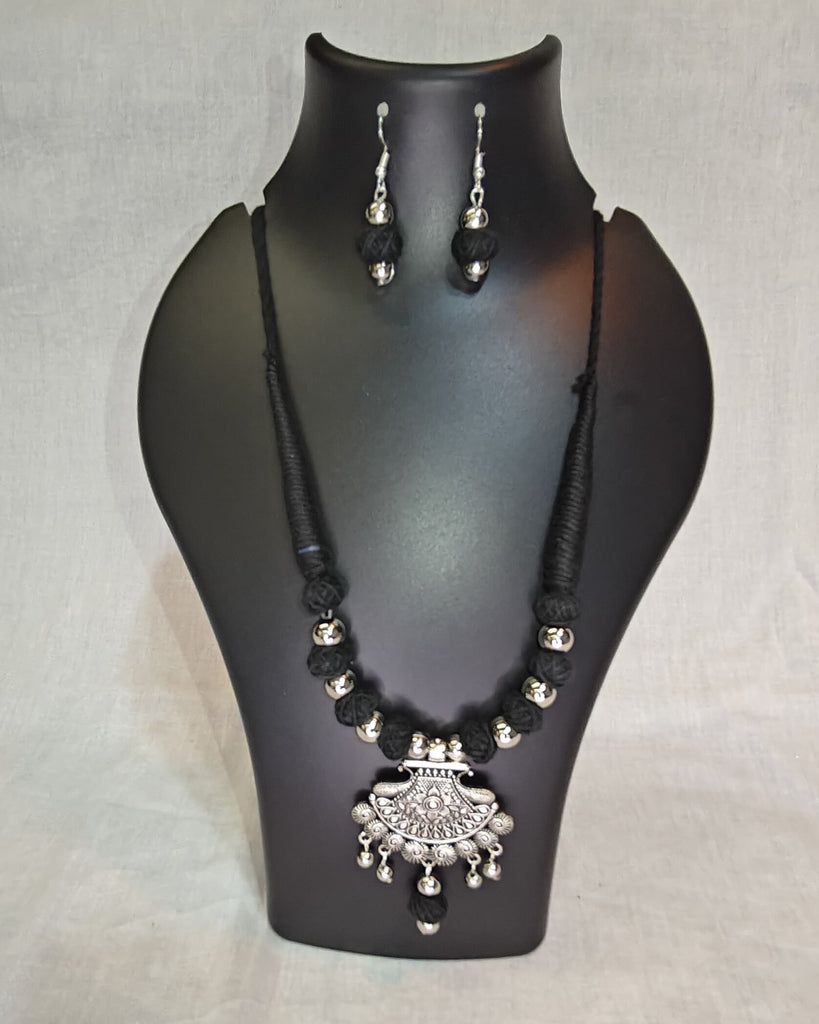 Black thread necklace