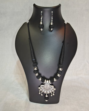 Black thread necklace