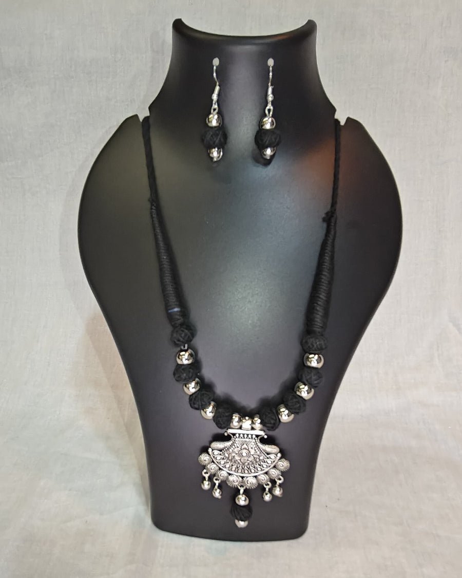 Black thread necklace