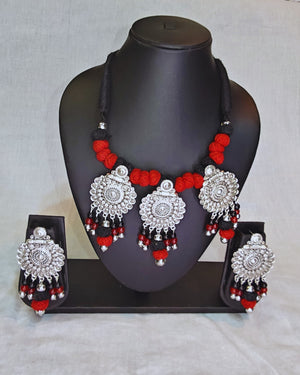 Red and black thread with oxidised pendant necklace