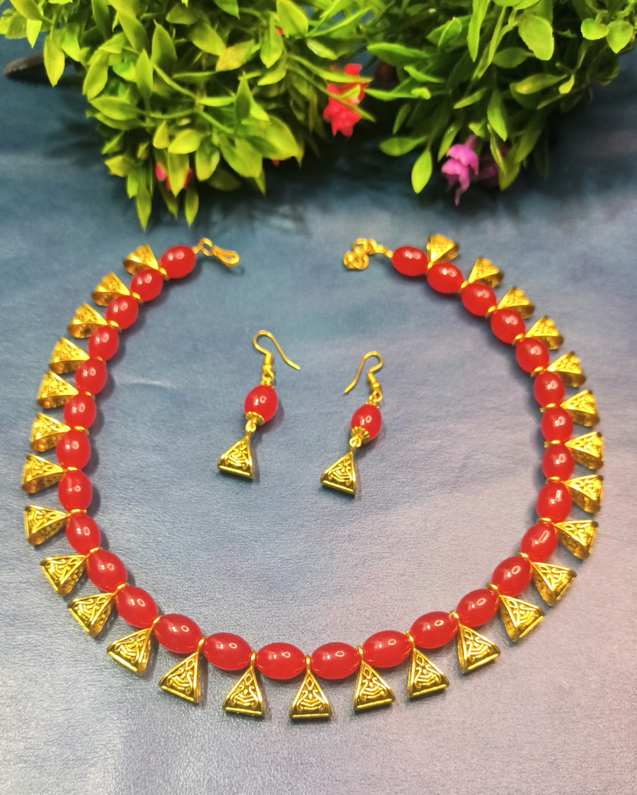 Red beads with golden charms choker